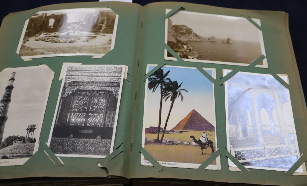 A topographical postcard album including India and Chinese views and two books